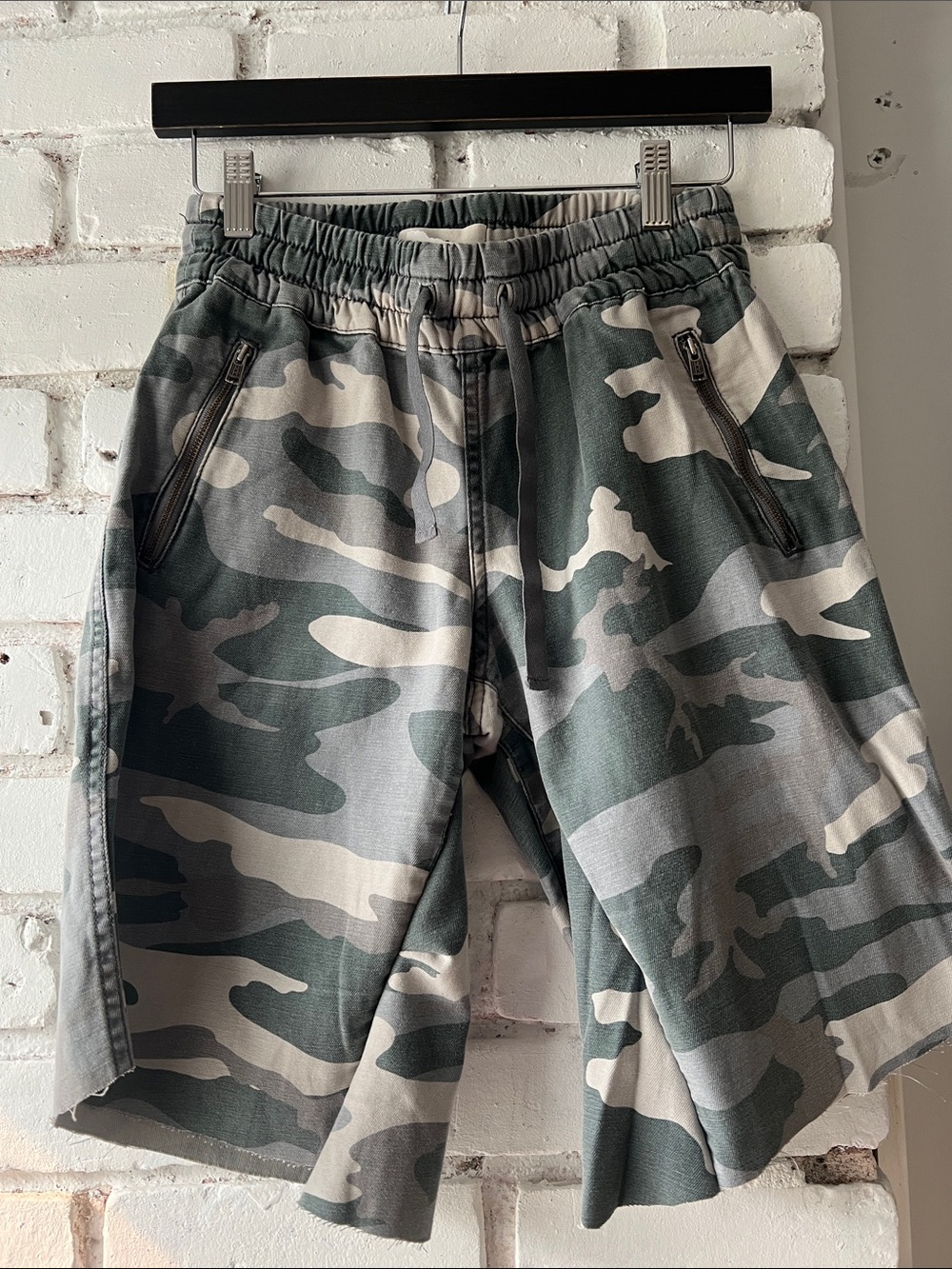 Upcycled cargo Jorts TNA brand with camo pattern and draw string